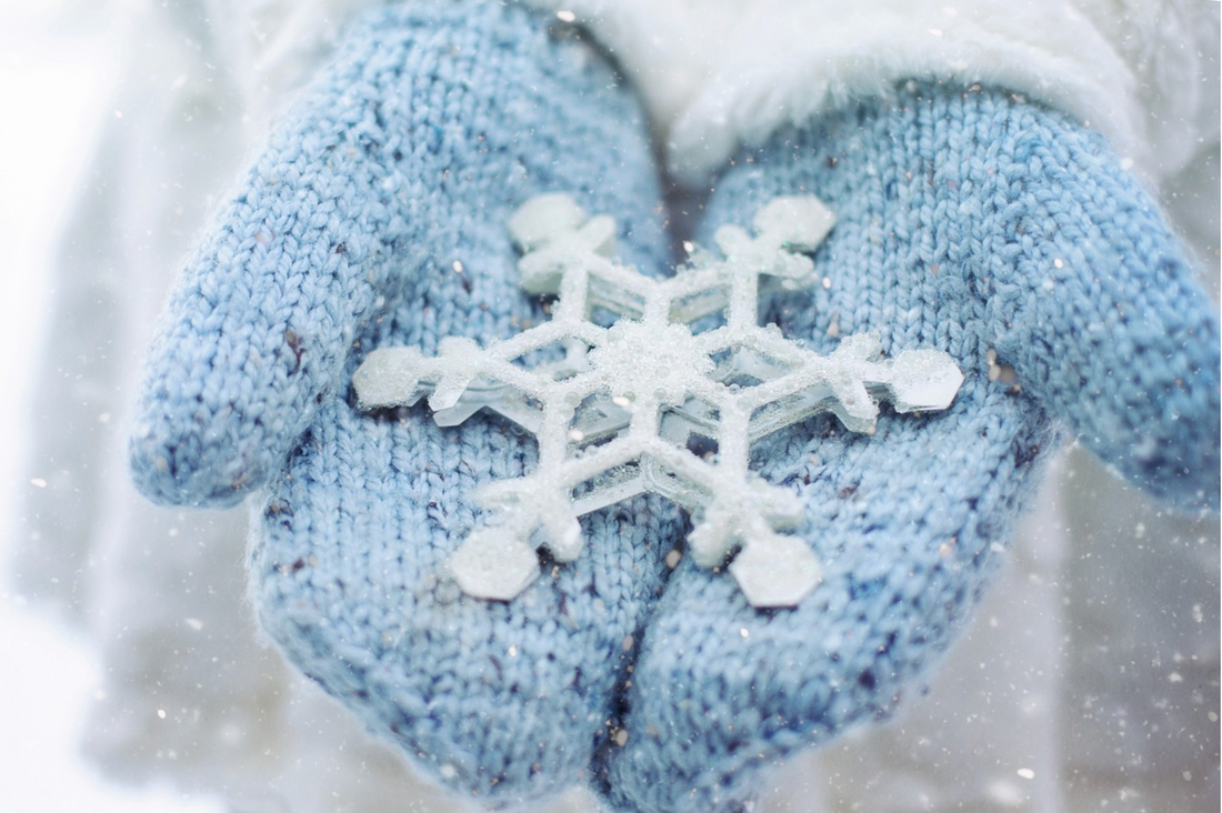 blue gloves giving a snowflake 